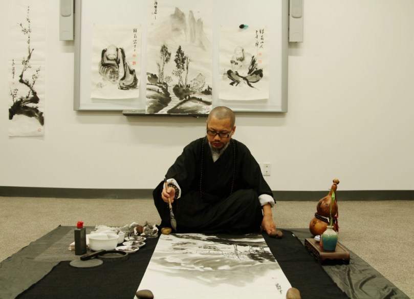 Yixiong GU artists to demo Zen brush painting.