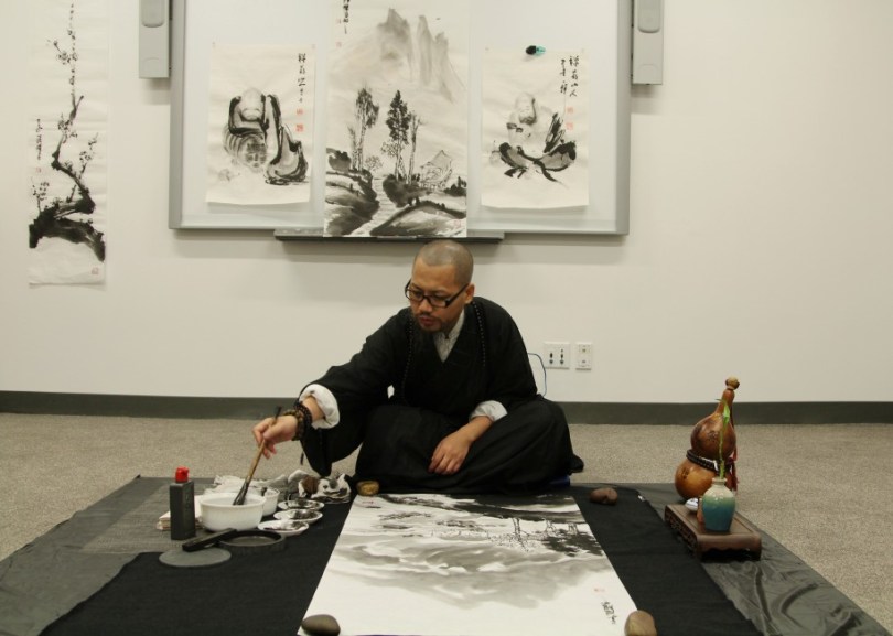 Yixiong GU artists to demo Zen brush painting.