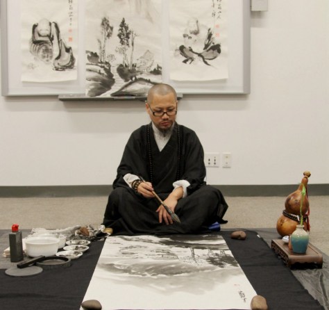 Yixiong GU artists to demo Zen brush painting.