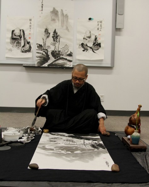 Yixiong GU artists to demo Zen brush painting.